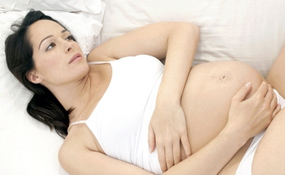 Боли в животе при беременности, симптомы и последствия